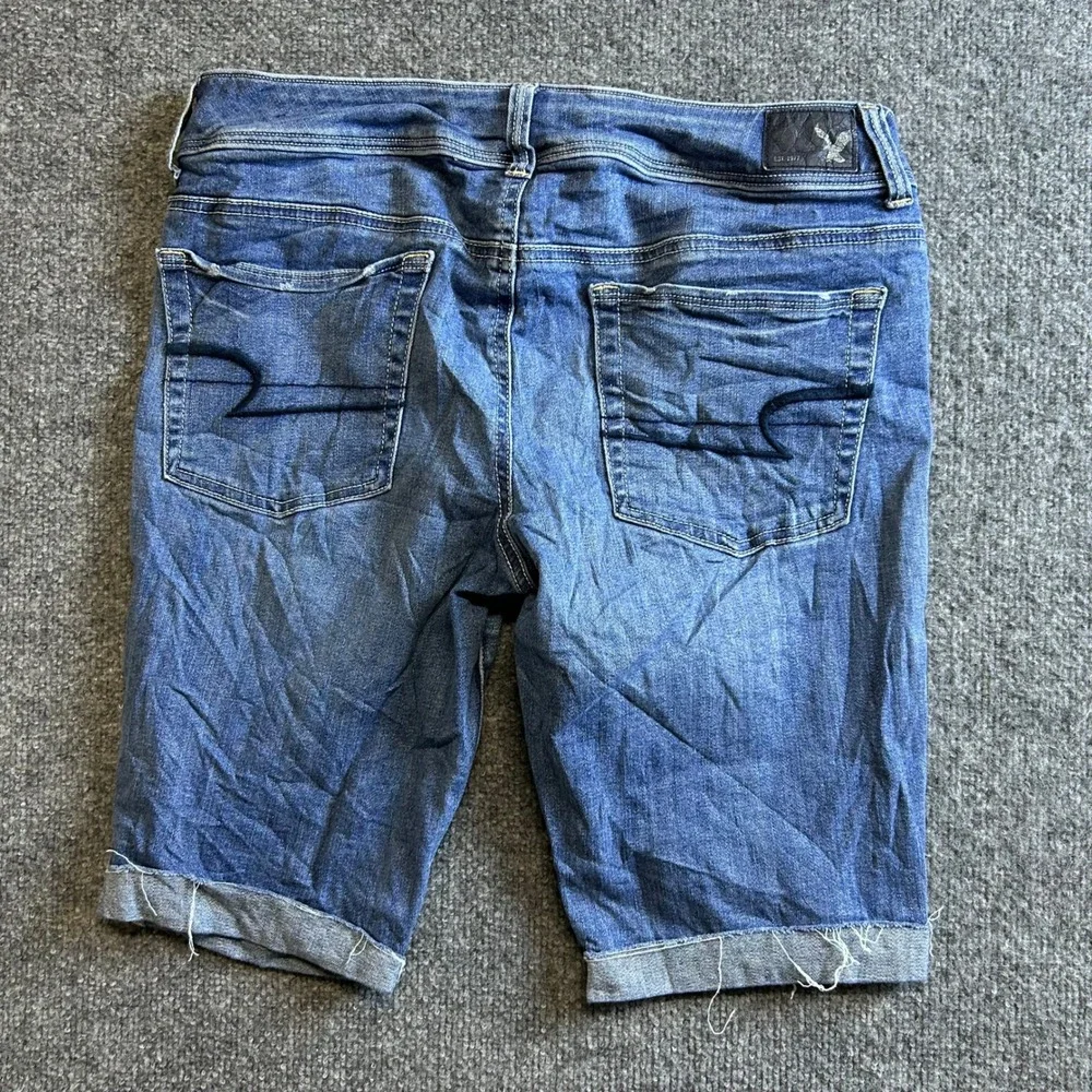 American Eagle Shorts Womens Size 12 Long Blue Super Stretch Denim Raw Hem